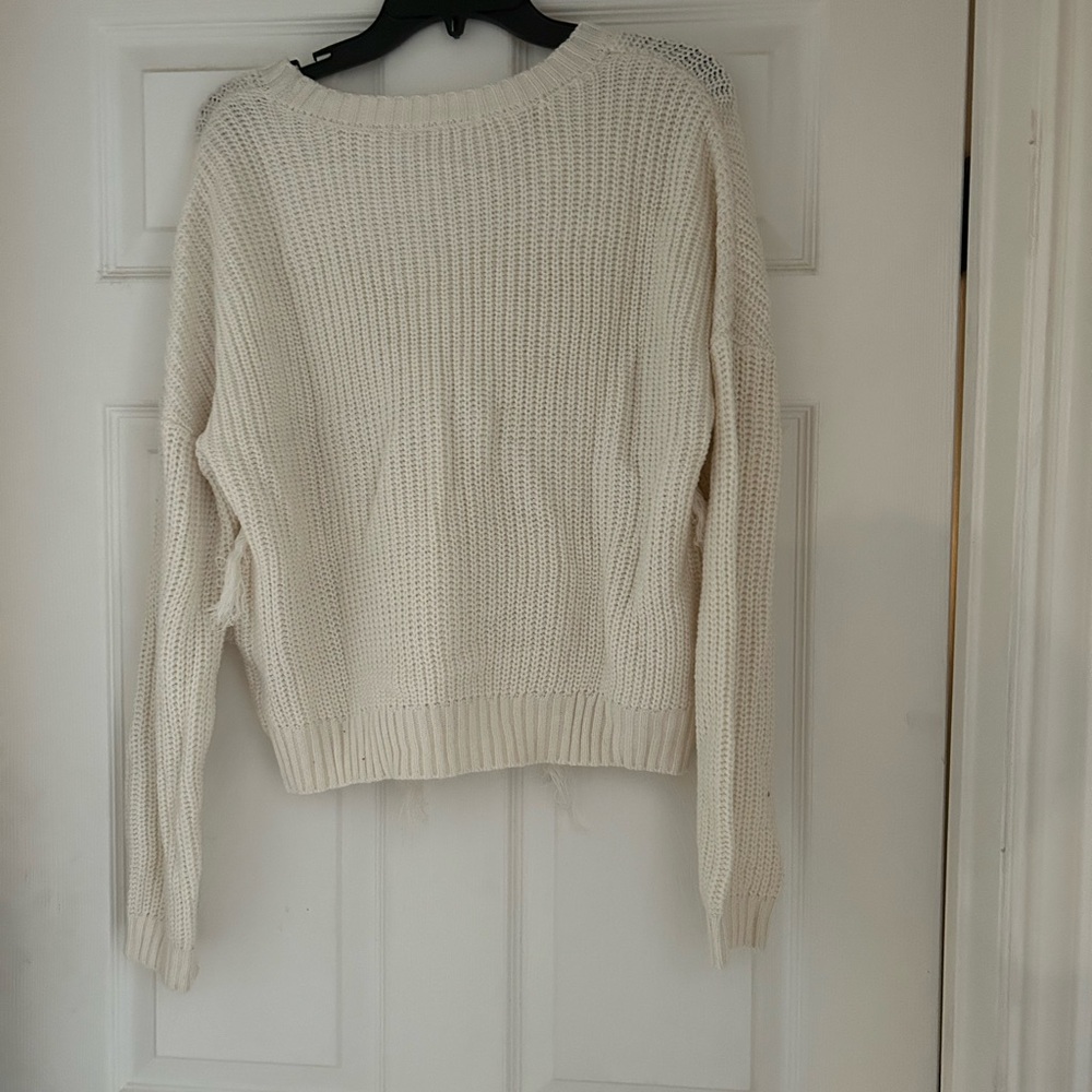 Off white sweater perfect condition . Great boho piece for this winter .